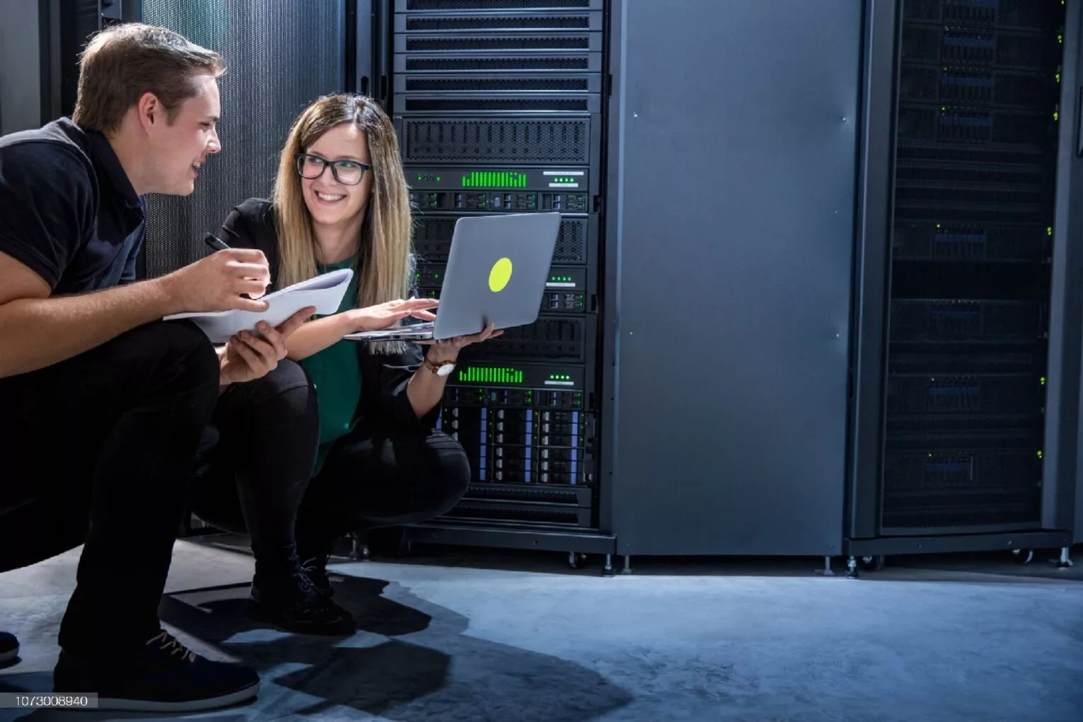 IT experts man and woman happy working on an IT project